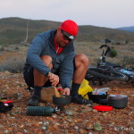 David cooking dinner on Day 3 of our Central Desert crossing