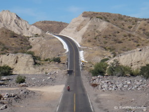 Jo cycling the "slope of hell" to the coast near Santa Rosalia!