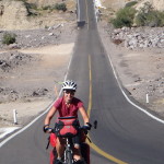 Jo cycling the awesome "slope of hell" to the coast near Santa Rosalia!
