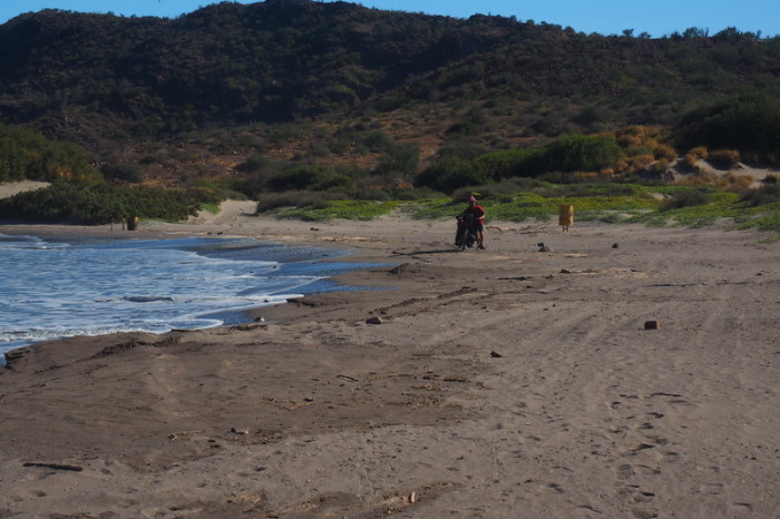 Baja California - David pushing his fully loaded bike across the sand