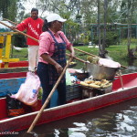 You can buy all kinds of food and drinks while floating along the canals! This canoe was selling freshly roasted sweetcorn smile emoticon — in Xochimilco