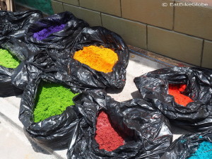 Bags of coloured sawdust for making the carpets, Flores, Guatemala