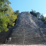 Jo descending Nohuch Mul pyramid at Coba, Quintana Roo, Mexico