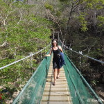 Walking across the suspension bride across Rio Negro