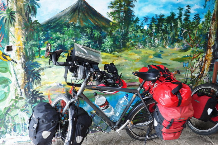 Costa Rica - Our bikes with the mural at Toad Hall, Laguna de Arenal, Costa Rica