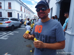 David enjoying some pineapple on the streets of Popayan
