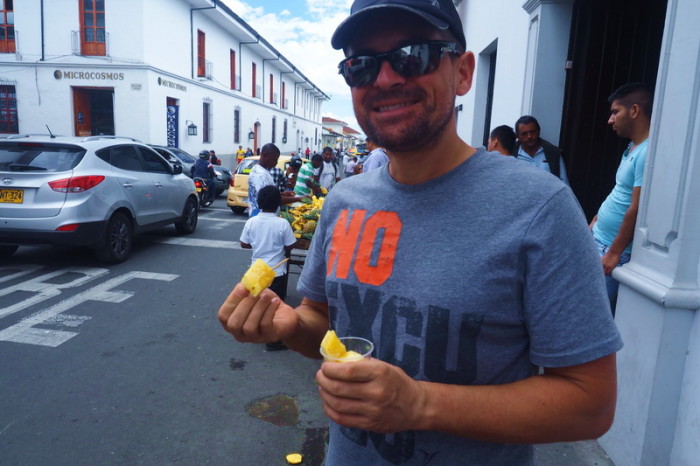 Colombia - David enjoying some pineapple on the streets of Popayan