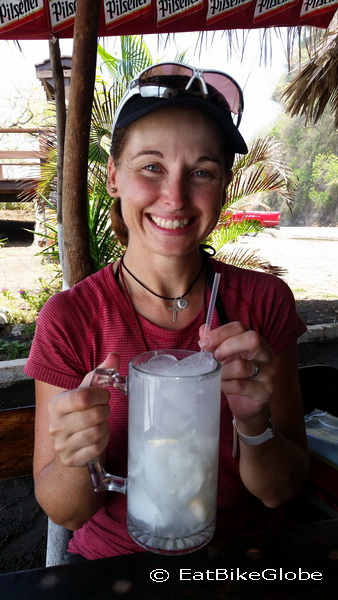 Enjoying an ice cold coconut water!