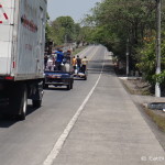 This is how most people get around in El Salvador - on the back of a pick up truck!