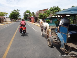 Overtaking horse and carts on the way to the port at San Jorge, Nicaragua