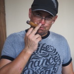 David trying a cigar, Dona Elba Cigar tour, Granada, Nicaragua