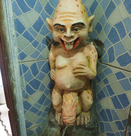 Ecuador - This little figure features in the ladies toilets at the Museum of Extreme Art, Cuenca