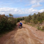 Jo pushing her bike up the hill from Hacienda El Hato to the highway!
