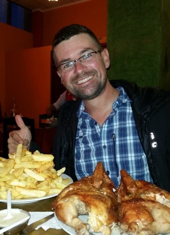 Peru - Enjoying the biggest meal of chicken and chips EVER in Cayamarca!