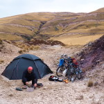 So, we set up camp on a sandy patch of the rocky road and prayed for rain!