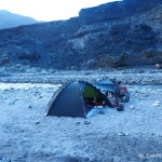 Our tents and bikes on the river bed