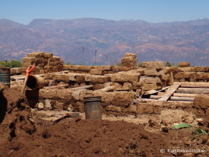 House being constructed out of mud bricks