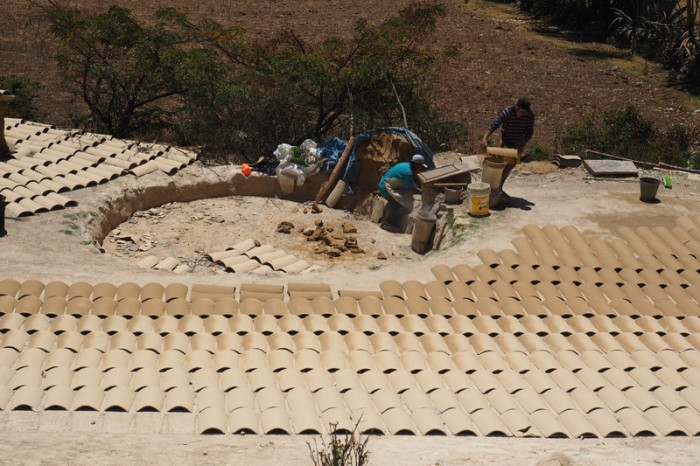 Peru  - Clay/mud roof tiles drying in the sun