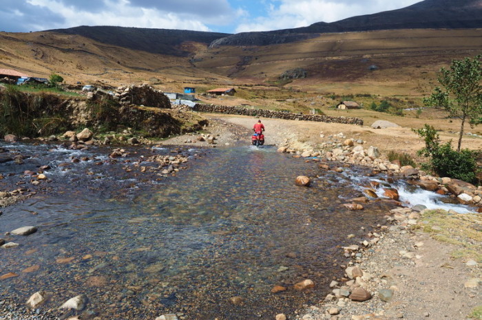 Peru  - Our first river crossing at around 3900m. David got his feet wet here!