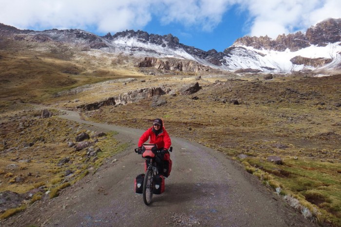 Peru - Jo cycling the Pastoruri "Highway" - it was freezing cold! 