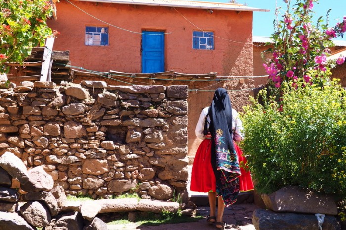 Peru - Our host mother outside her house, Amantani Island, Lake Titicaca