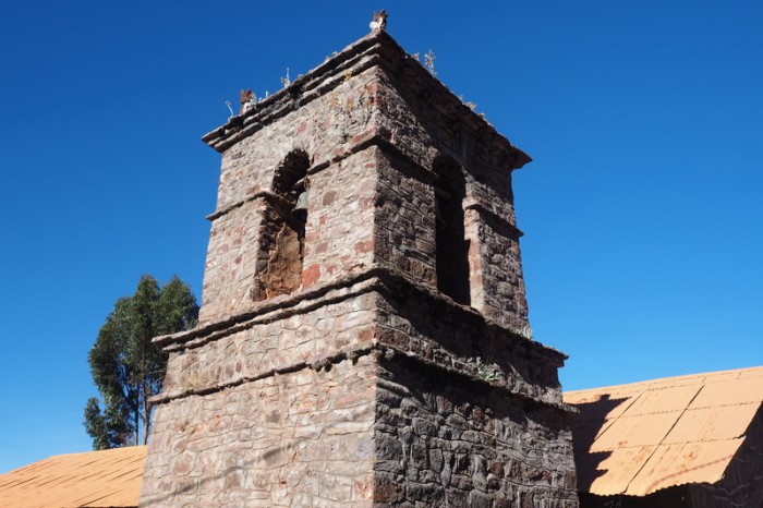 Peru - Church tower in the main square, Amantani Island, Lake Titicaca