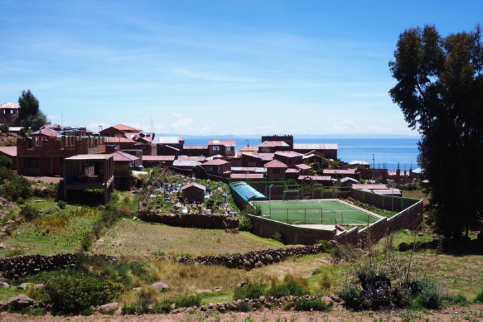 Peru - The cemetery is located right next to the soccer field! Taquile Island, Lake Titicaca