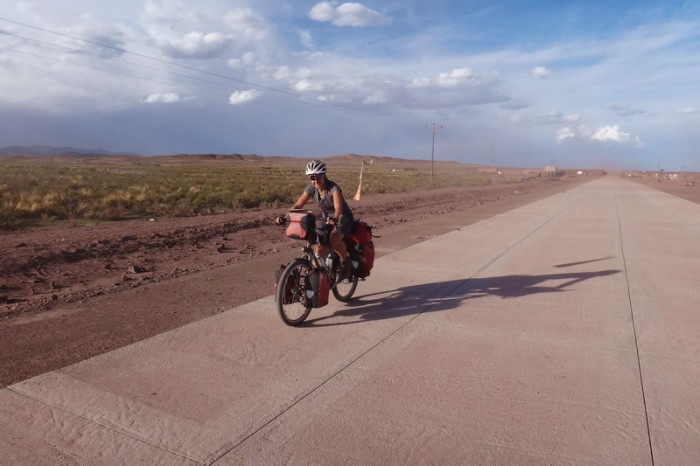Bolivia - The kind workmen let us cycle on the new road to get away from the dirt road and the dust! It was wonderful! 