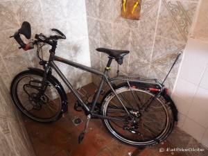 Giving our bikes a shower in our hotel!