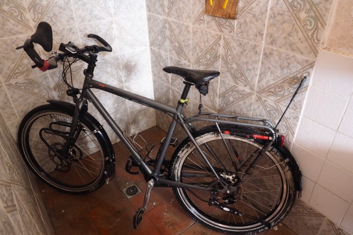 Bolivia - Giving our bikes a shower in our hotel!