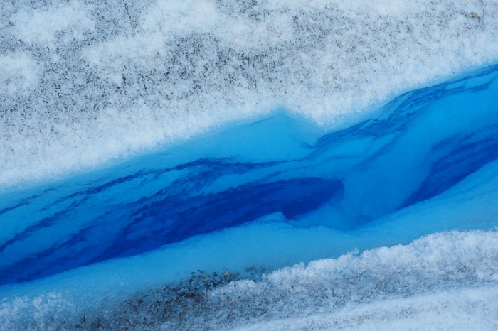 Argentina - Water filled glacial crevasse, Perito Moreno Glacier